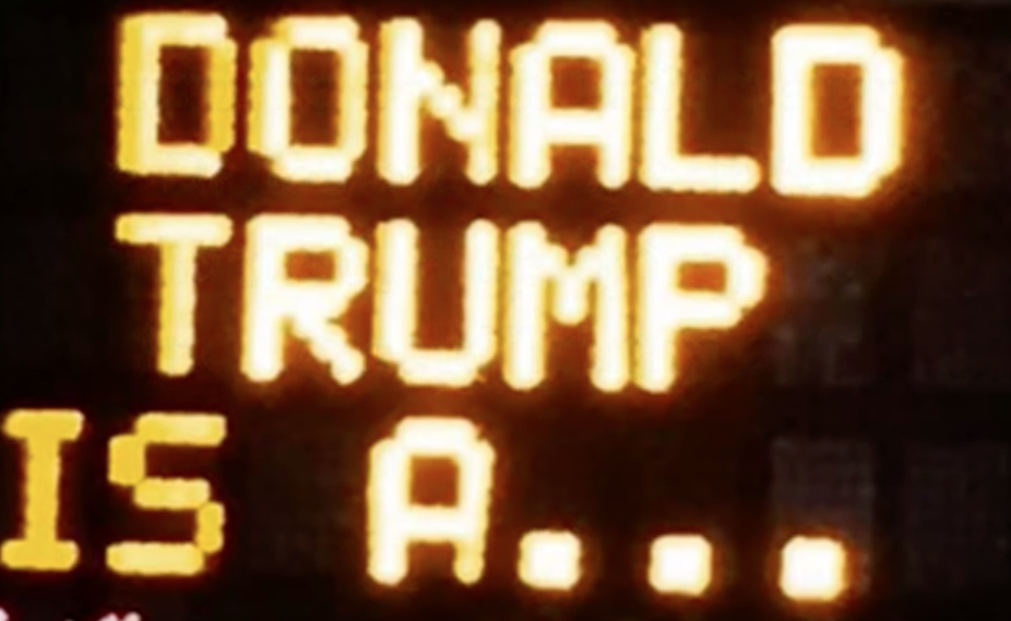 Image: Hacked Texas construction signs call Donald Trump a shape shifting lizard (Video)