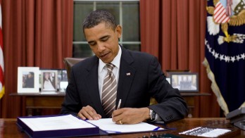 President Barack Obama signs H.R. 2751, the ÒFDA Food Safety Modernization Act,Ó in the Oval Office, Jan. 4, 2011.  (Official White House Photo by Pete Souza)
This official White House photograph is being made available only for publication by news organizations and/or for personal use printing by the subject(s) of the photograph. The photograph may not be manipulated in any way and may not be used in commercial or political materials, advertisements, emails, products, promotions that in any way suggests approval or endorsement of the President, the First Family, or the White House.